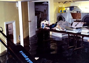 A laundry room flood with several feet of flooded water.