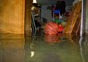 A flooded basement bedroom